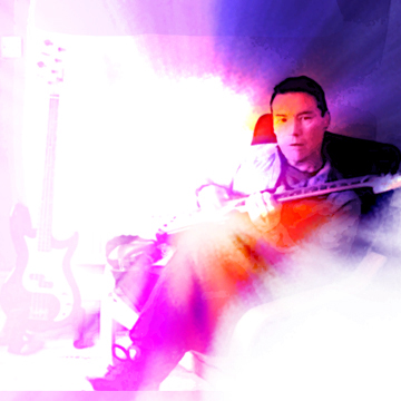 john cartwright with guitar in hand on a blurred psychadelic background