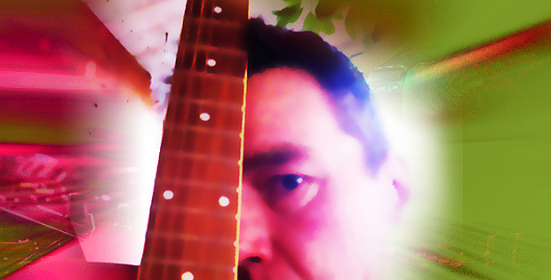 stylized self-portrait of john with guitar